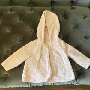 Light pink hoodie sweater with 3 silver buttons